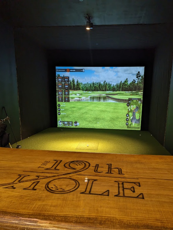 Image of a golf bay with table